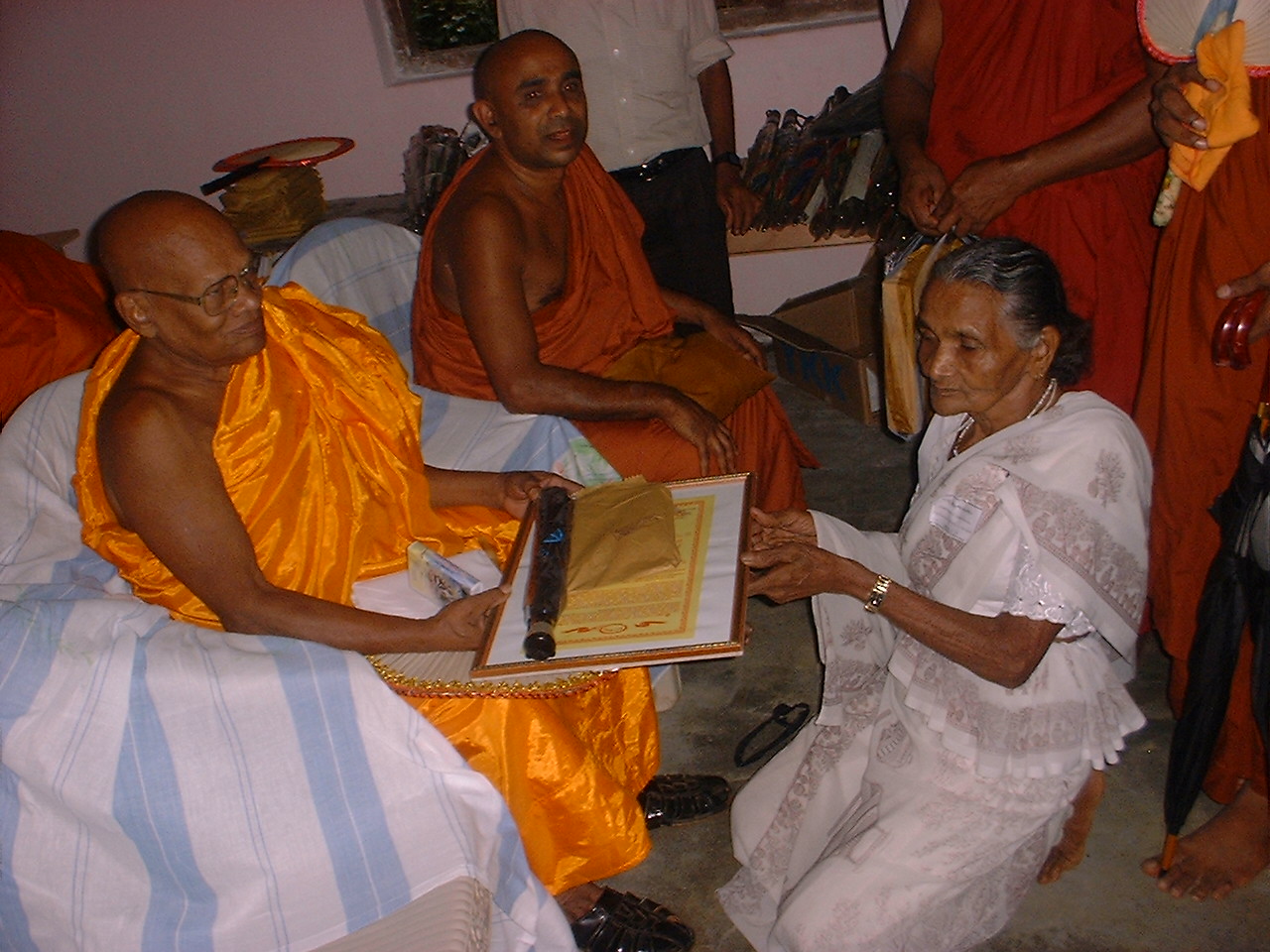 Parents Thanks giving day meeting in Sri Lanka 2006 my mother getting a gift from Maha nayaka thero -.JPG